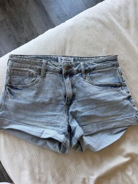 Re/Done Faded Light Blue Cuffed Denim Shorts